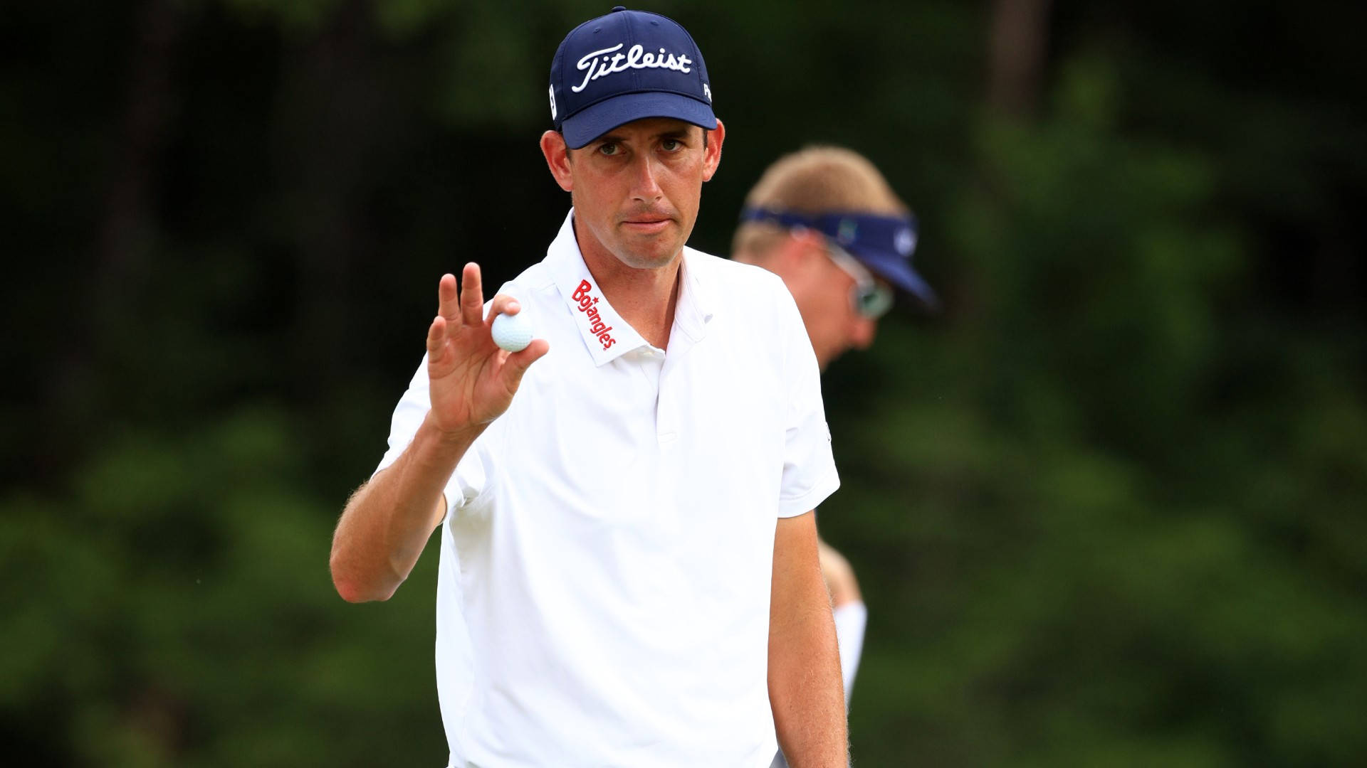 Chesson Hadley Holding Golf Ball Background