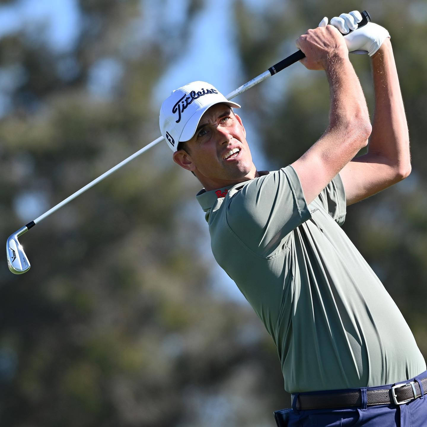 Chesson Hadley Swinging His Golf Club Background