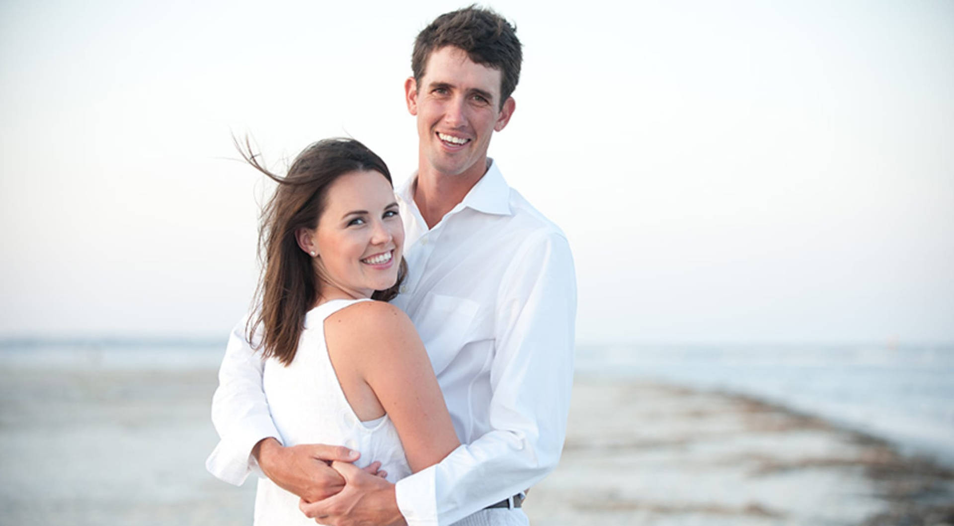 Chesson Hadley With Wife On Beach Background