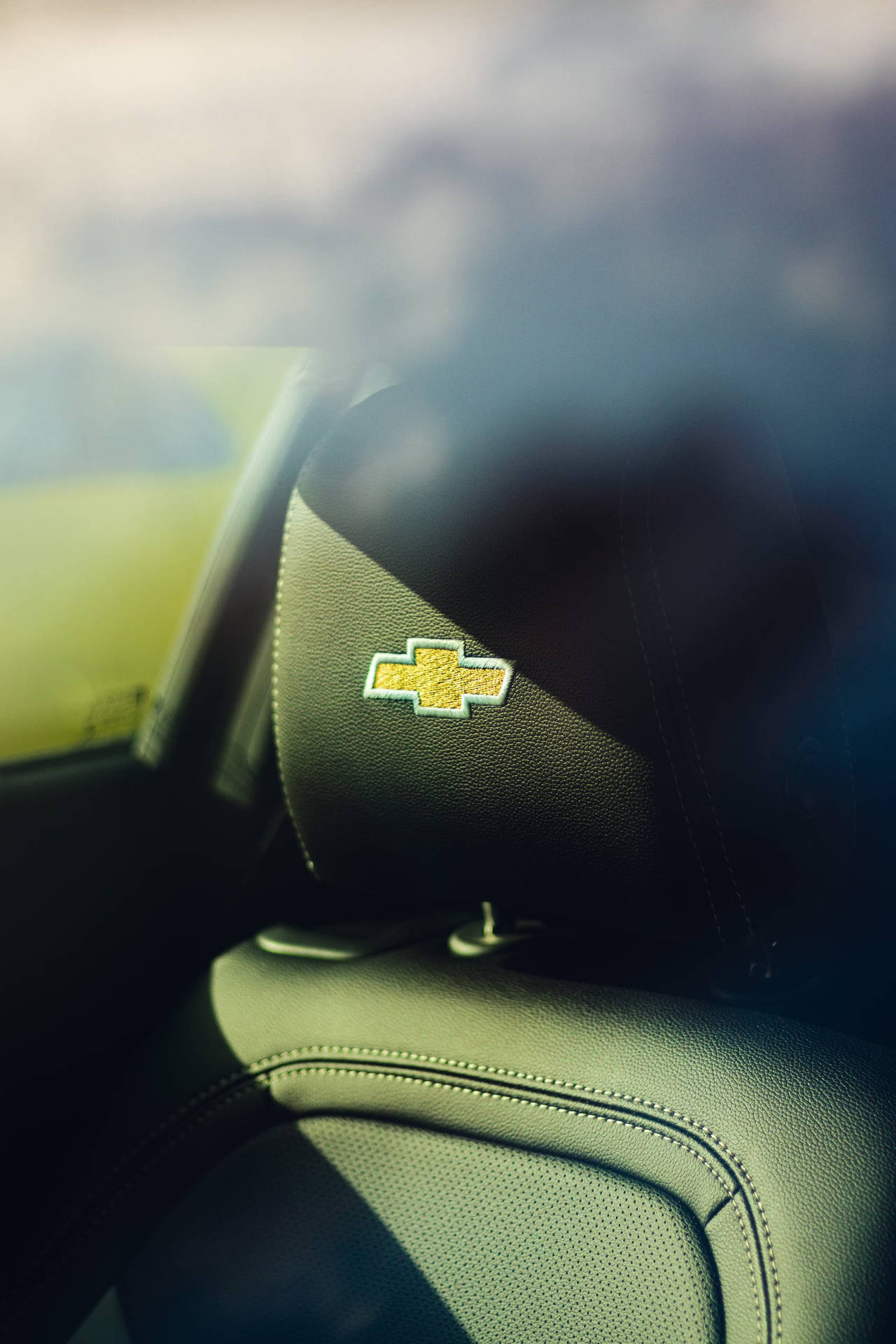 Chevrolet Logo On Headrest Background