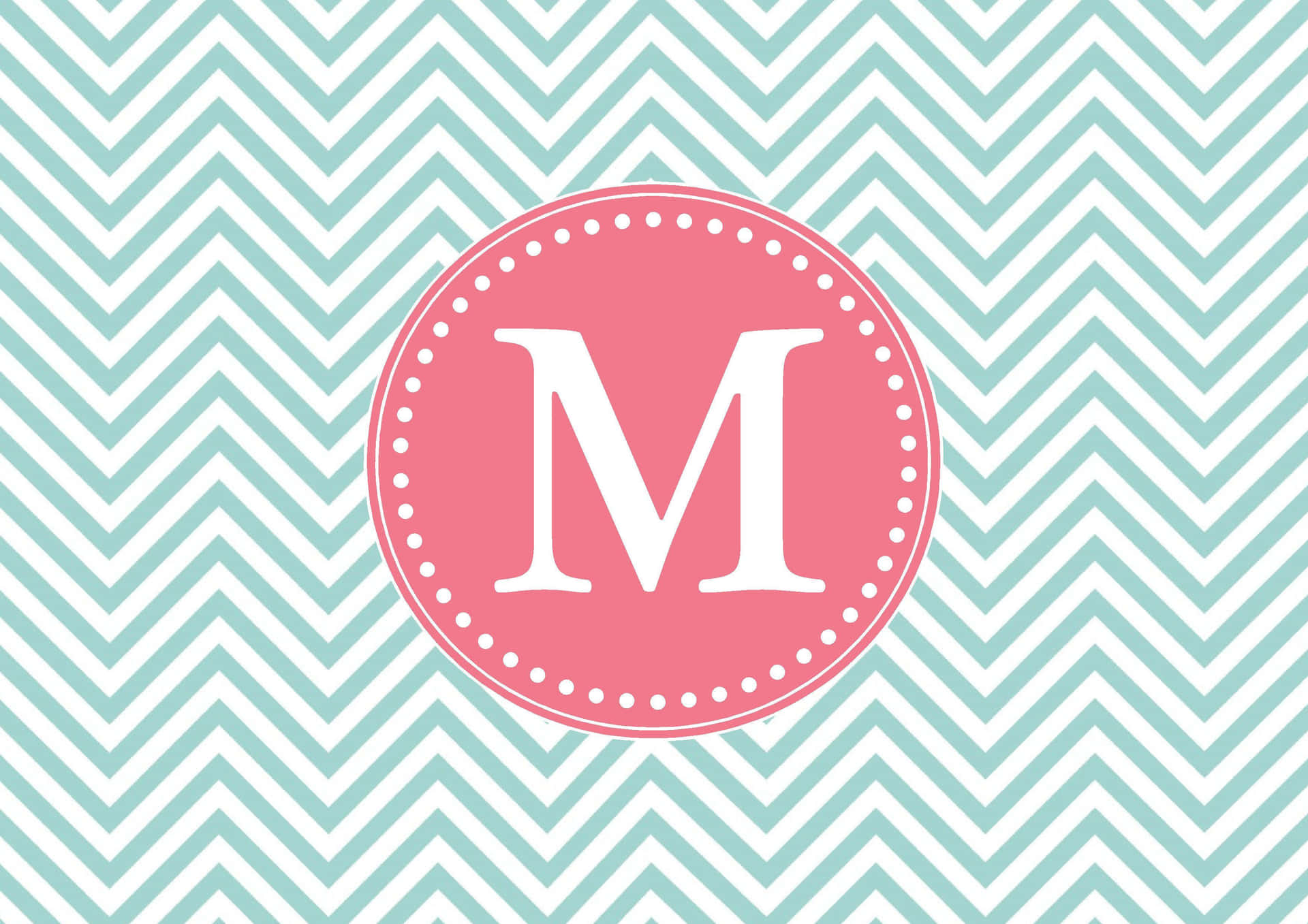 Chevron Pattern With The Letter M Background