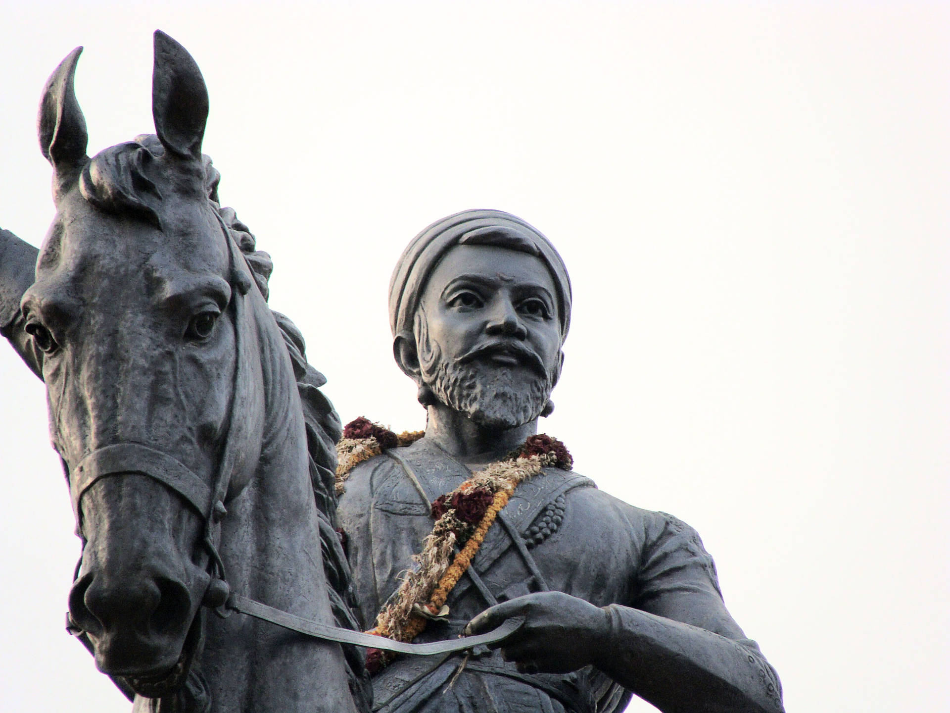 Chhatrapati Shivaji Maharaj Riding Horse Statue Background