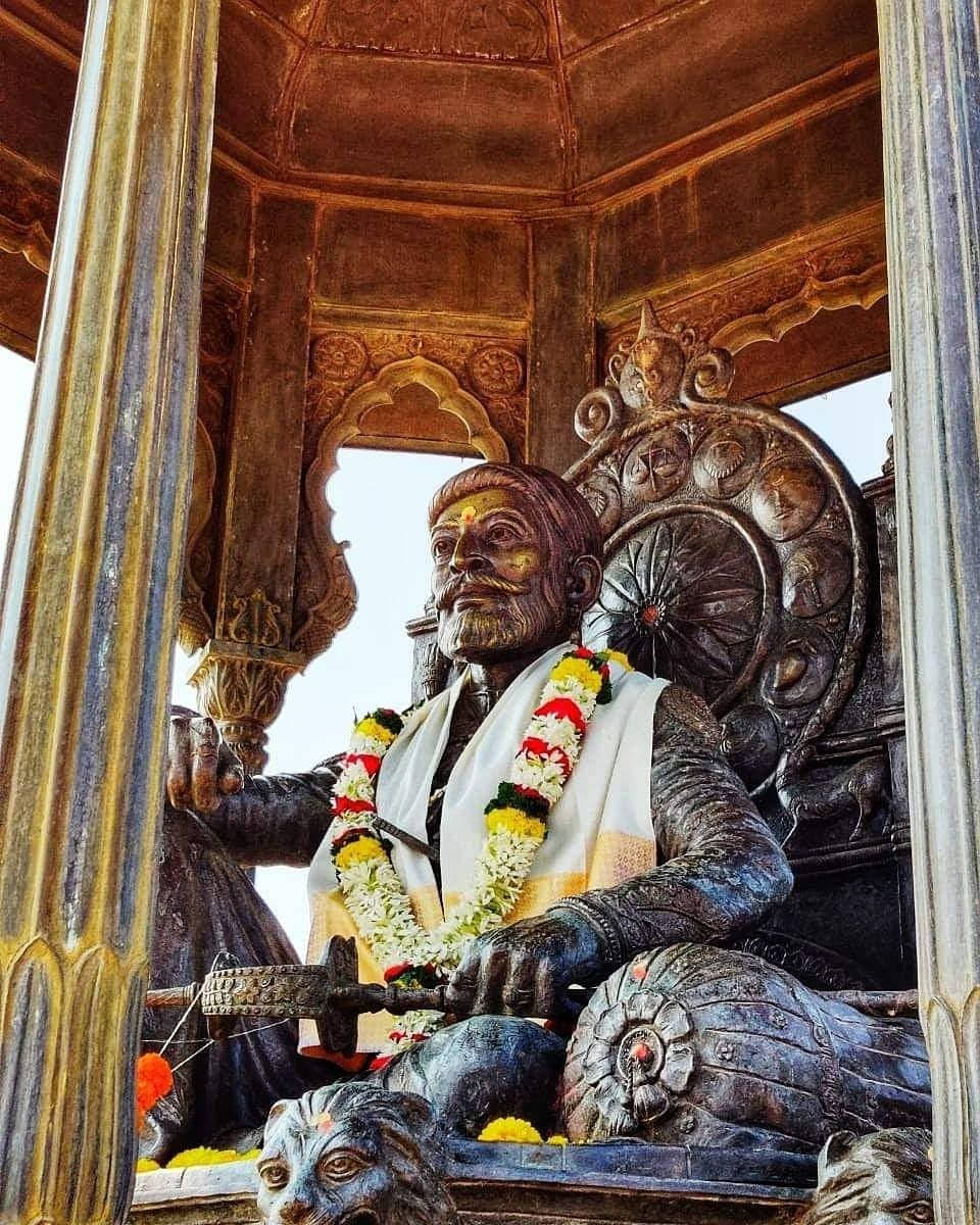 Chhatrapati Shivaji Maharaj With Colorful Garlands Background