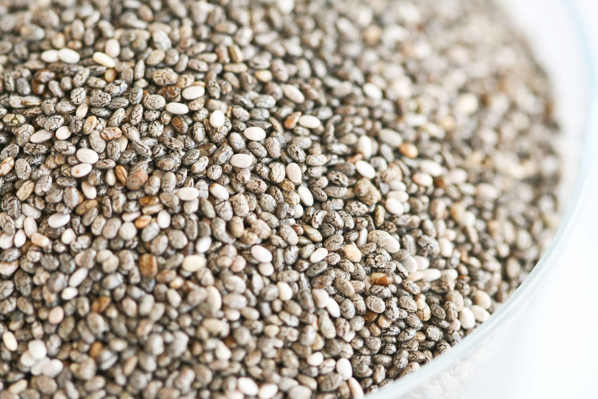 Chia Seeds In A Glass Bowl Background