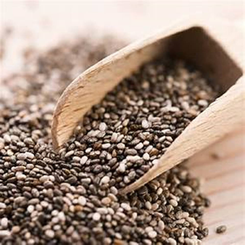 Chia Seeds In A Wooden Scoop