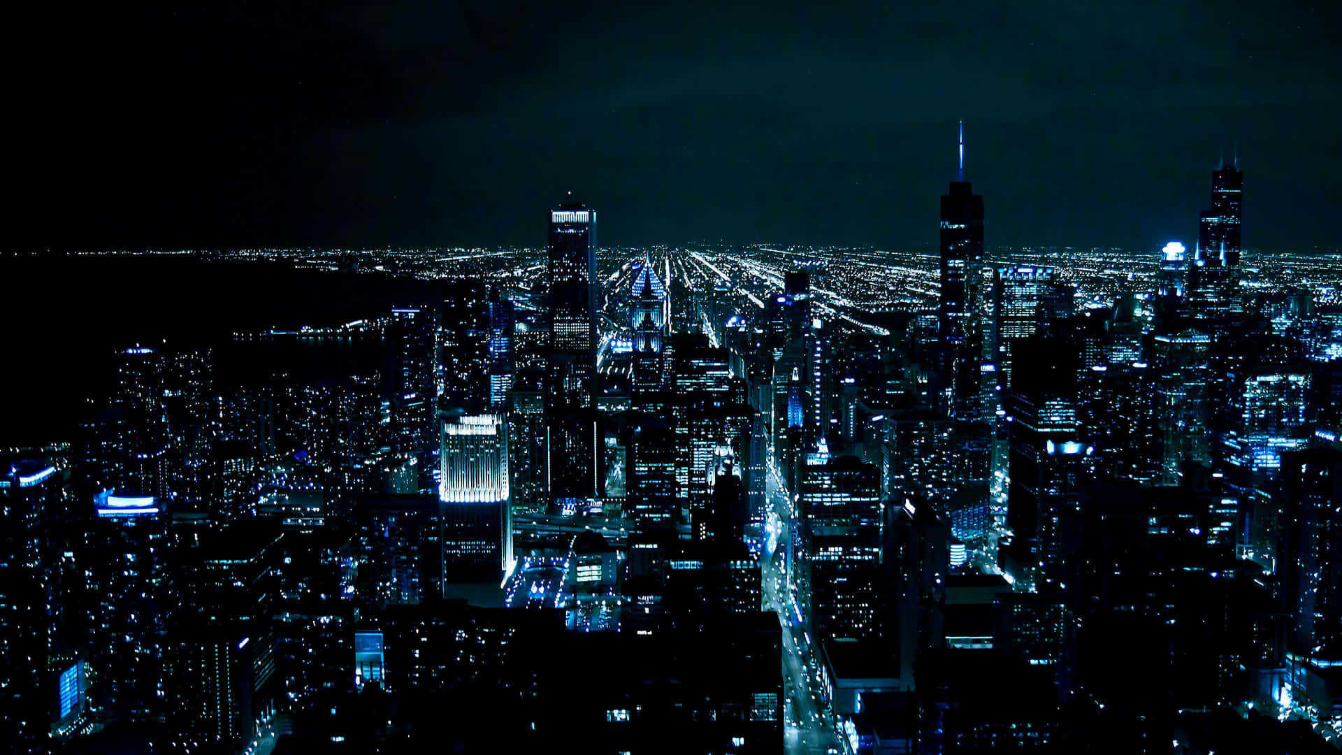 Chicago City At Night With Blue Lights Background