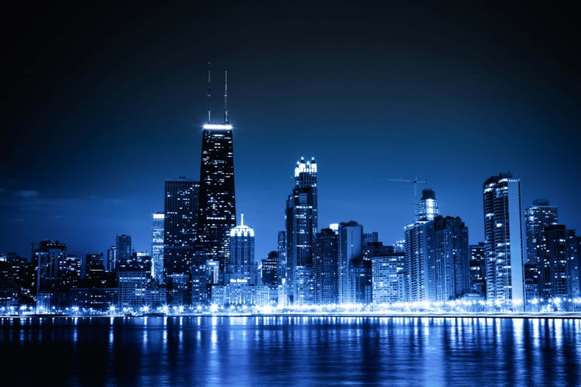 Chicago City Night Skyline With Blue Lights Background