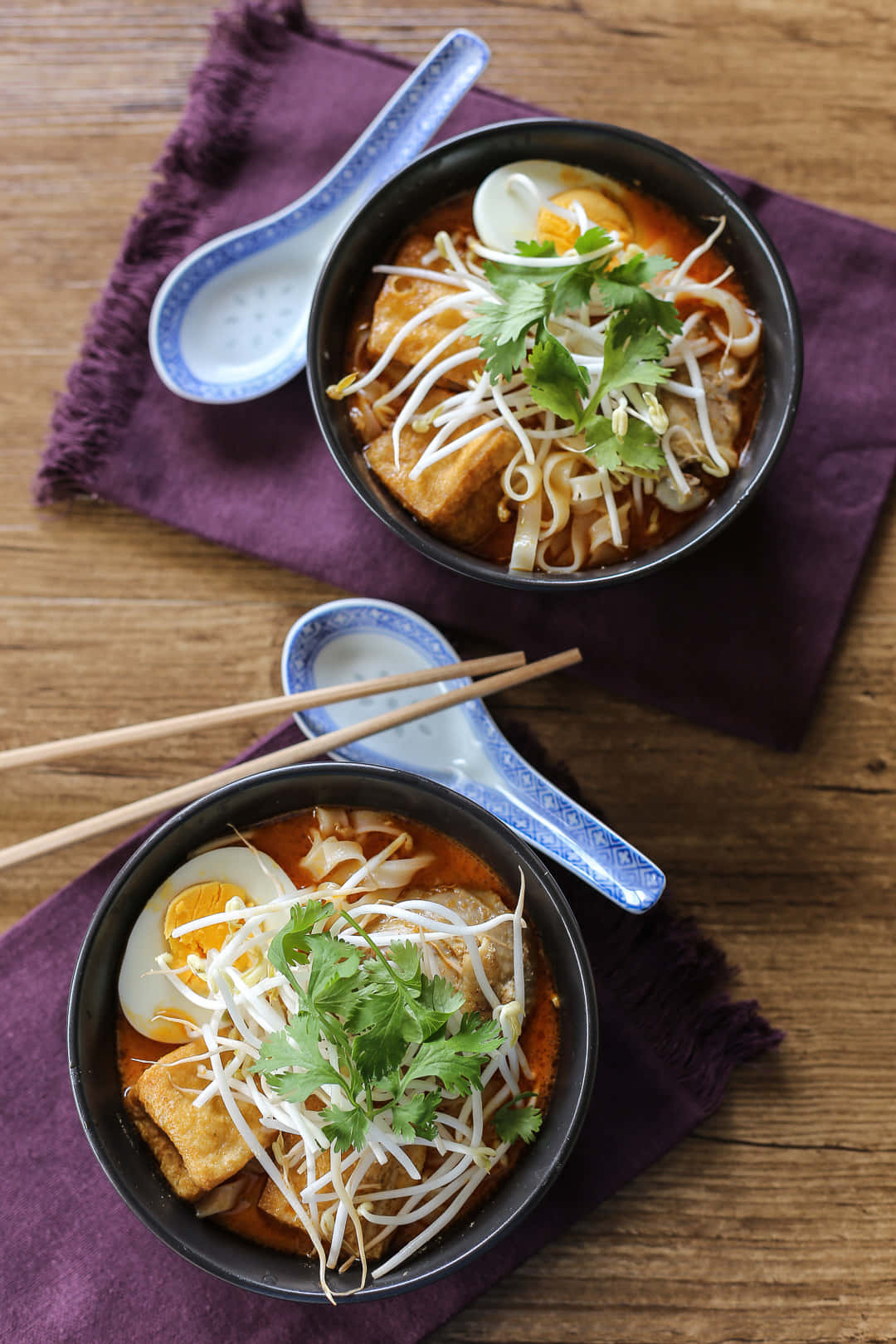 Chicken Curry Laksa On Purple Table Napkin