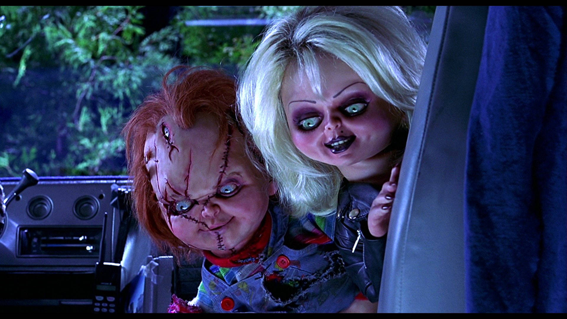 Child's Play Chucky And Tiffany In Car Background