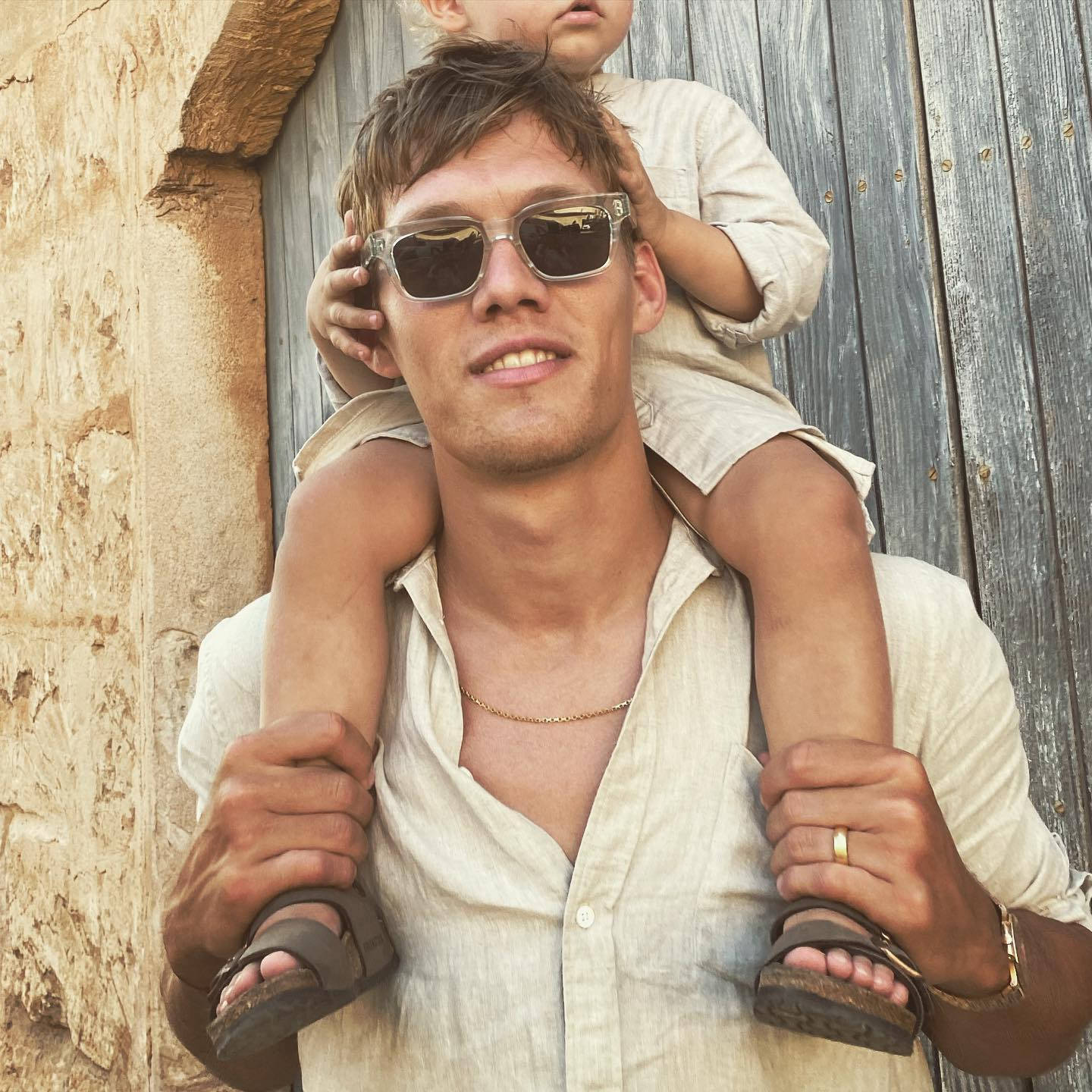 Child Sitting On Jannik Vestergaard’s Shoulders