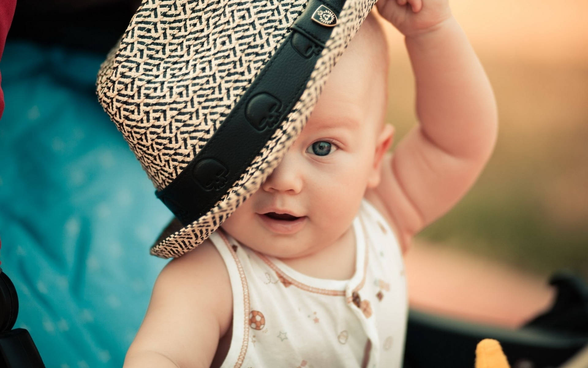 Child With Blue Eyes And Hat Background