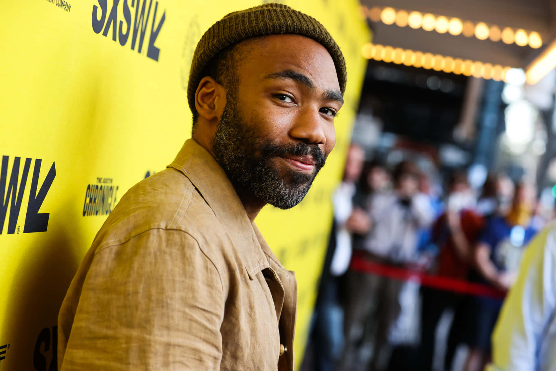 Childish Gambino Smilingat Event Background