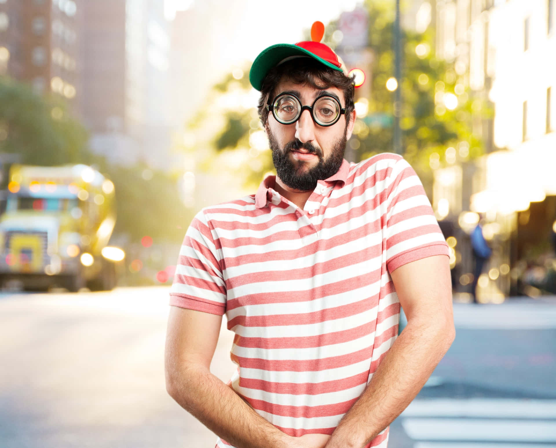 Childish Gawky Man In Pink Stripes Background