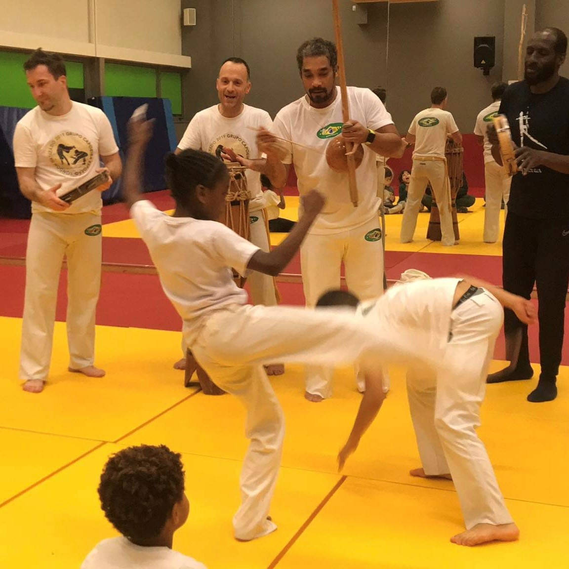 Children's Capoeira Class In Action Background