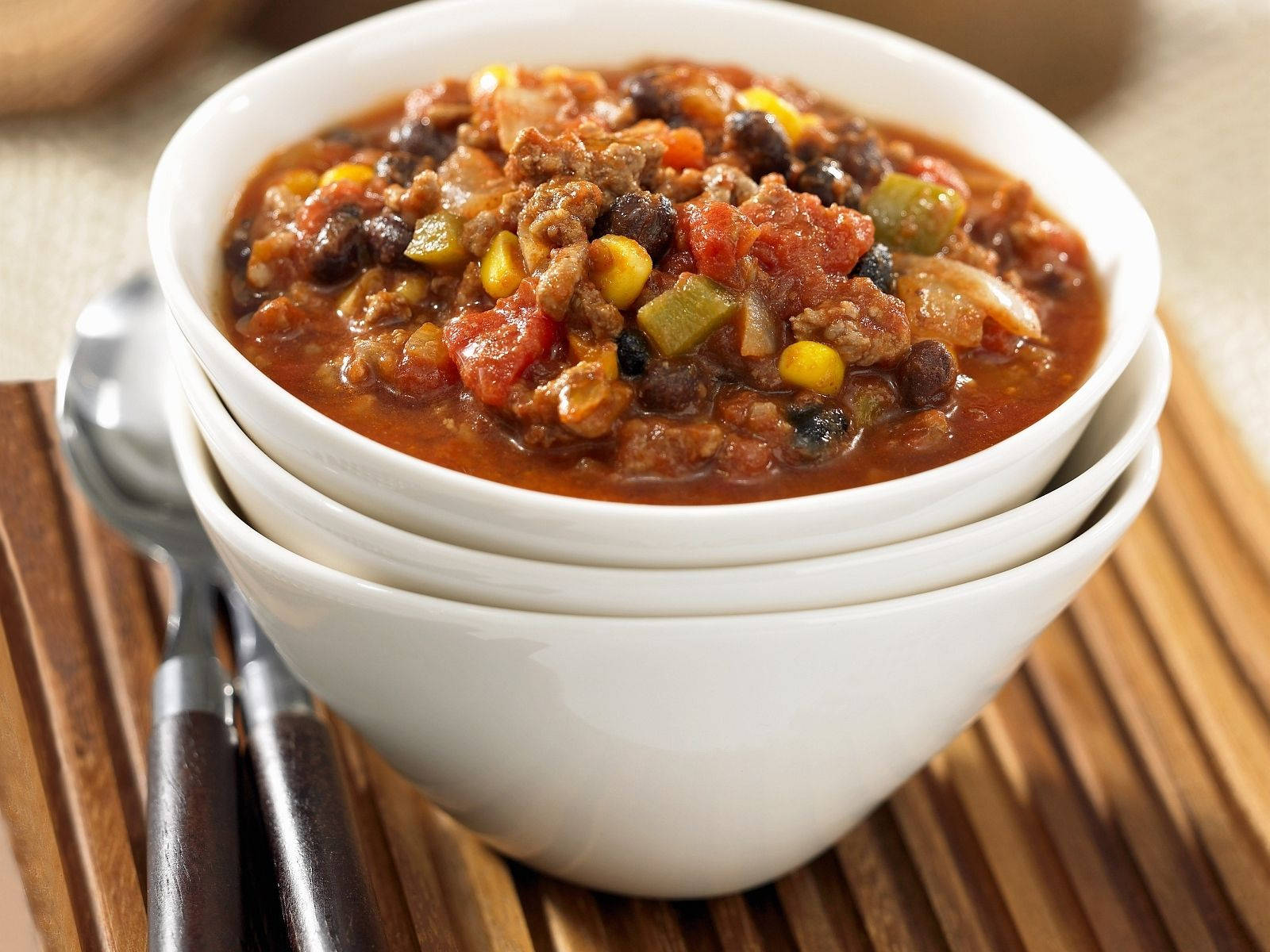 Chili Con Carne On Food Bowls Background