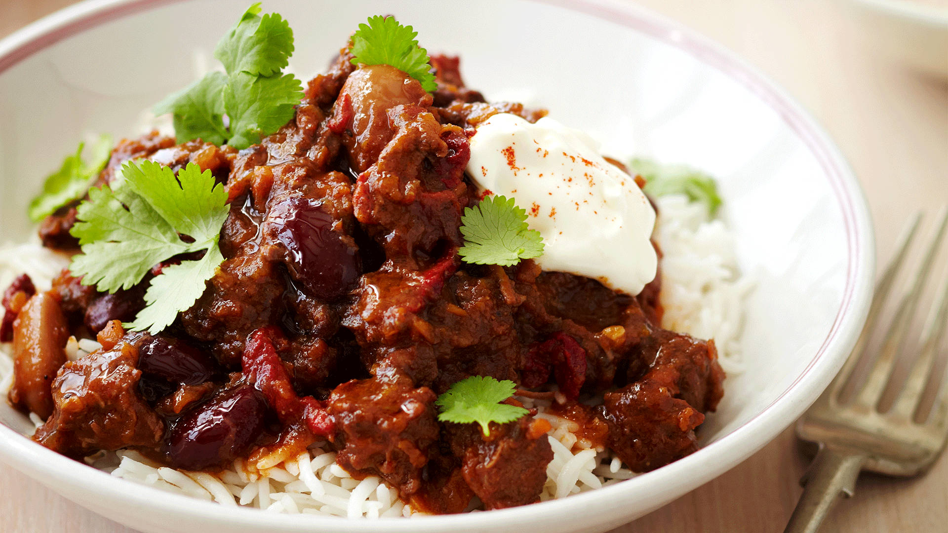 Chili Con Carne On White Rice Background