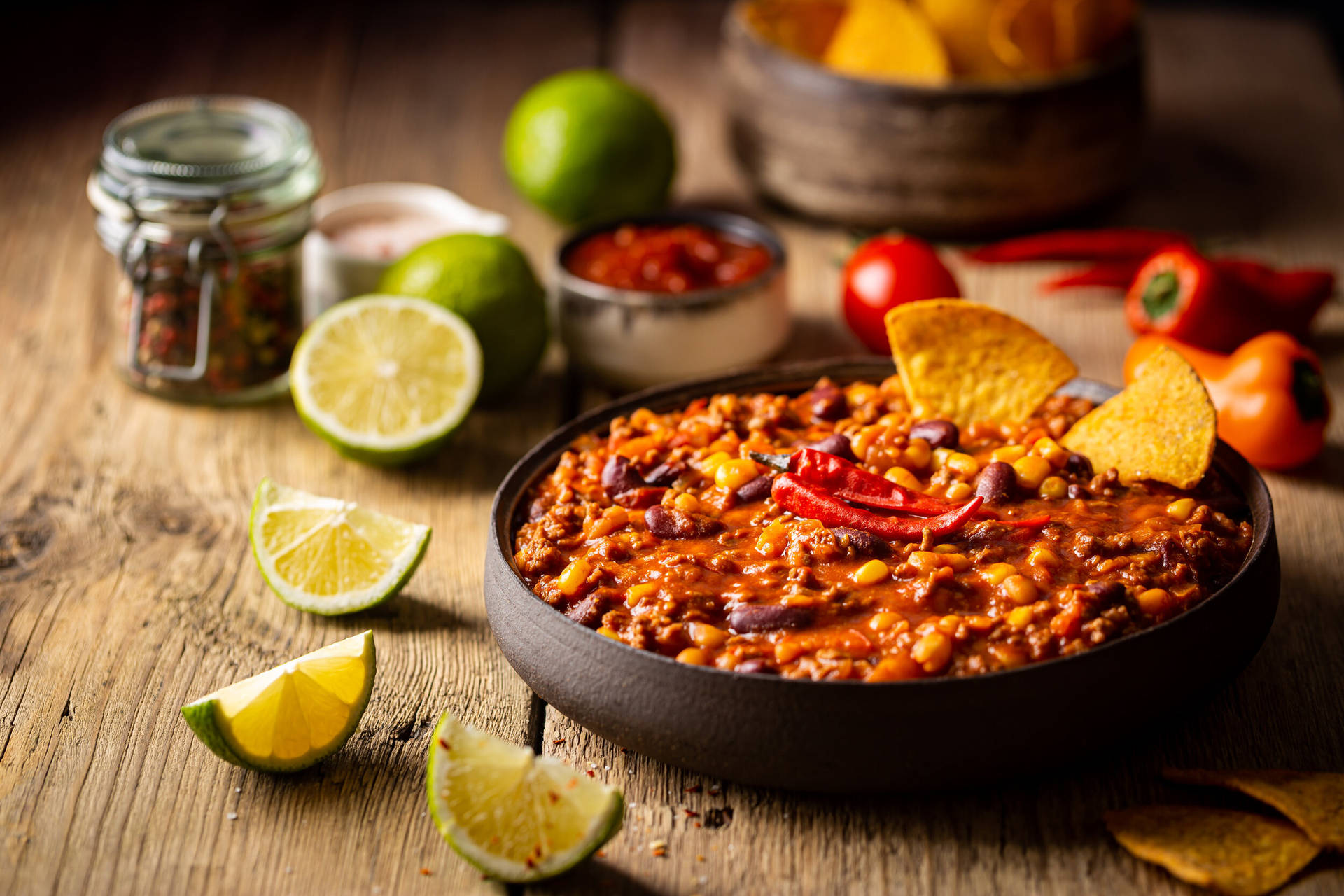 Chili Con Carne With Lime Fruits Background