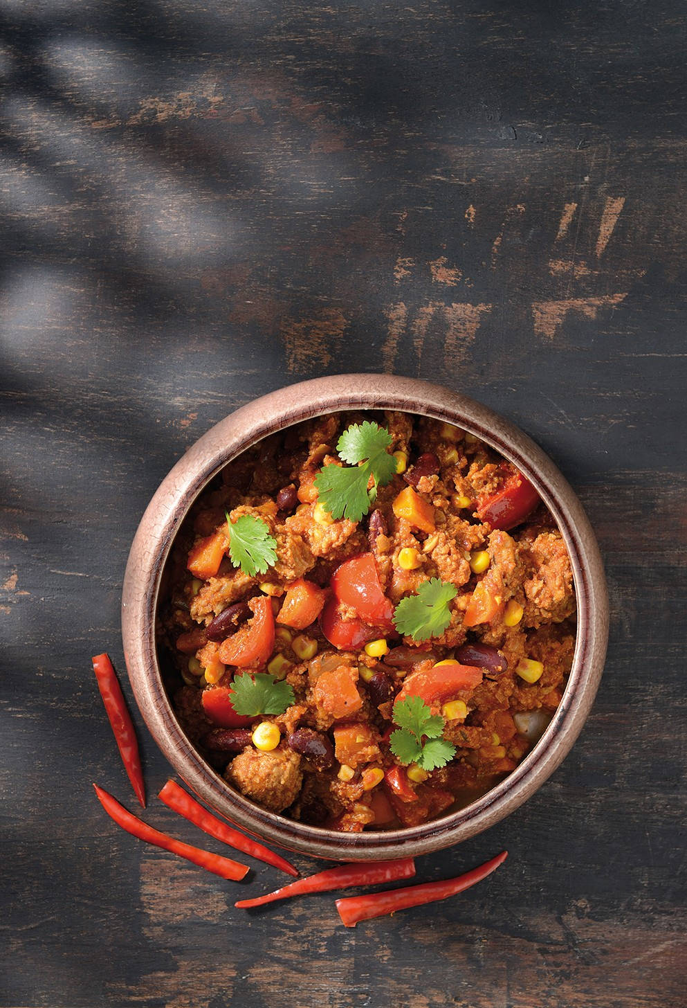 Chili Con Carne With Red Chilis Background