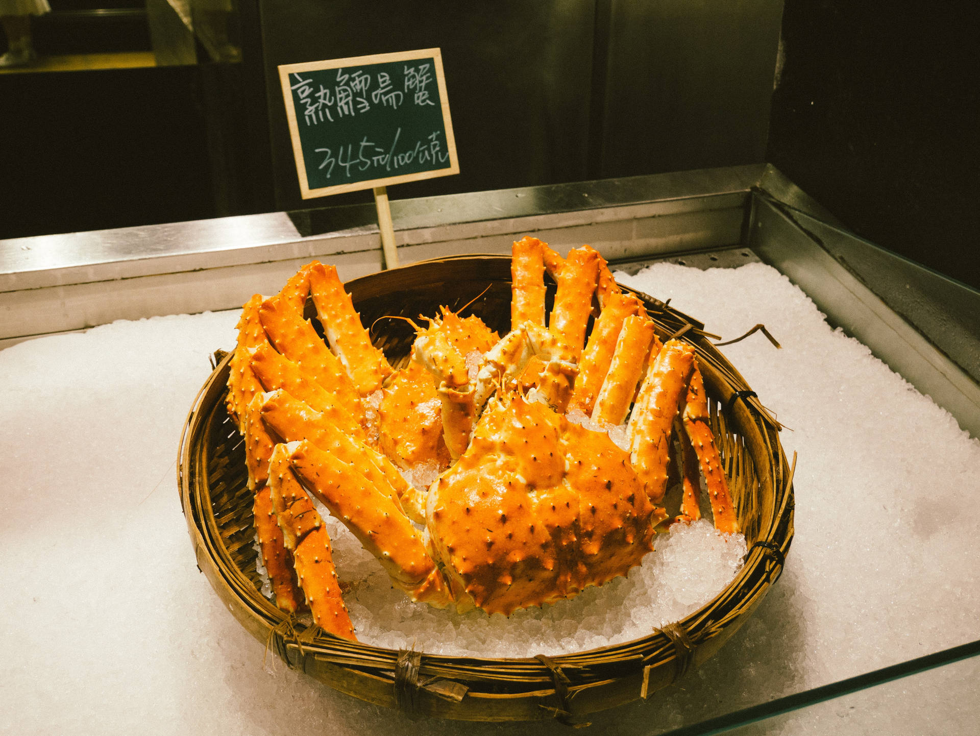 Chilled King Crab On A Wooden Basket Background