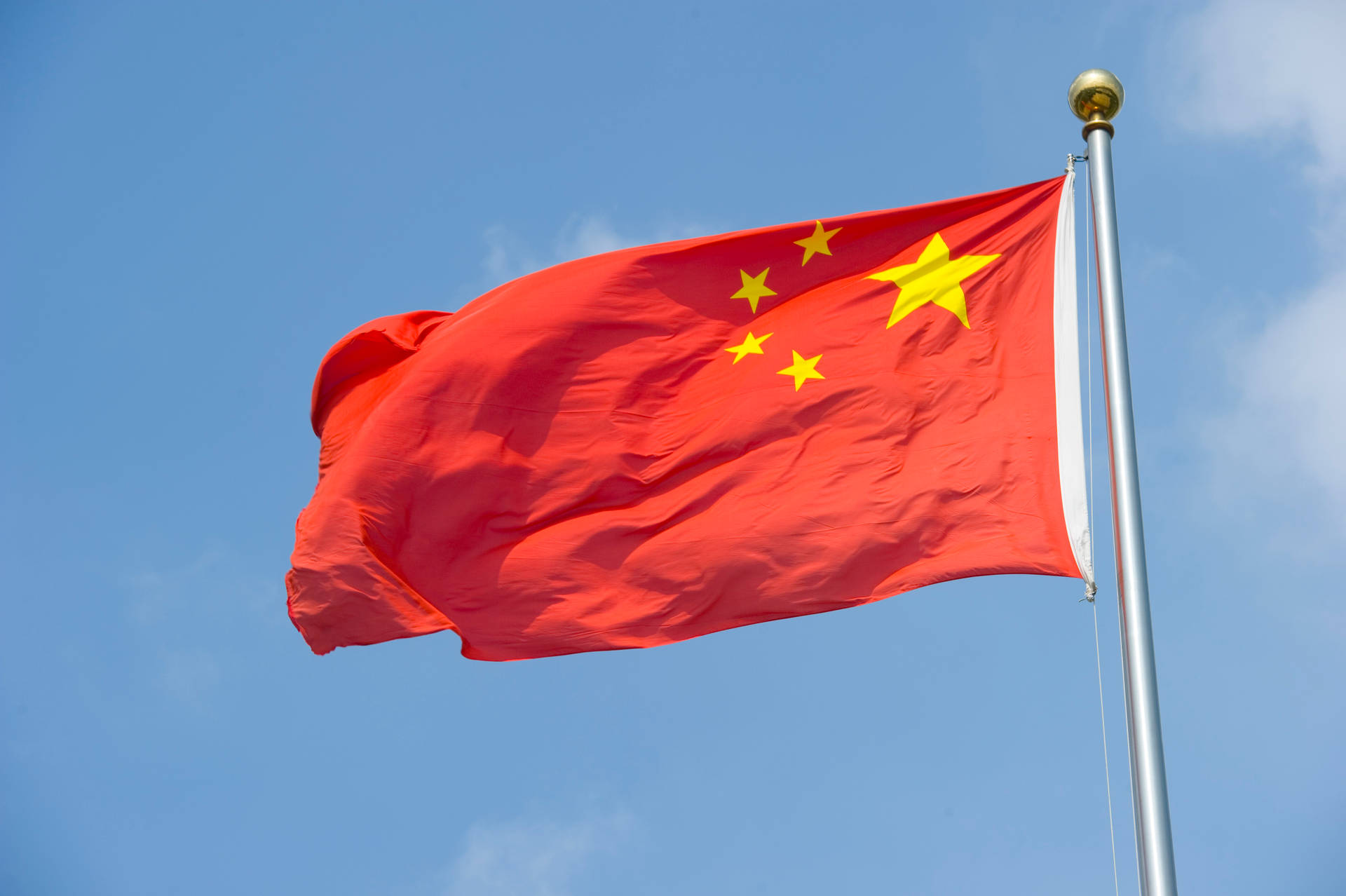 China Flag At Day Background