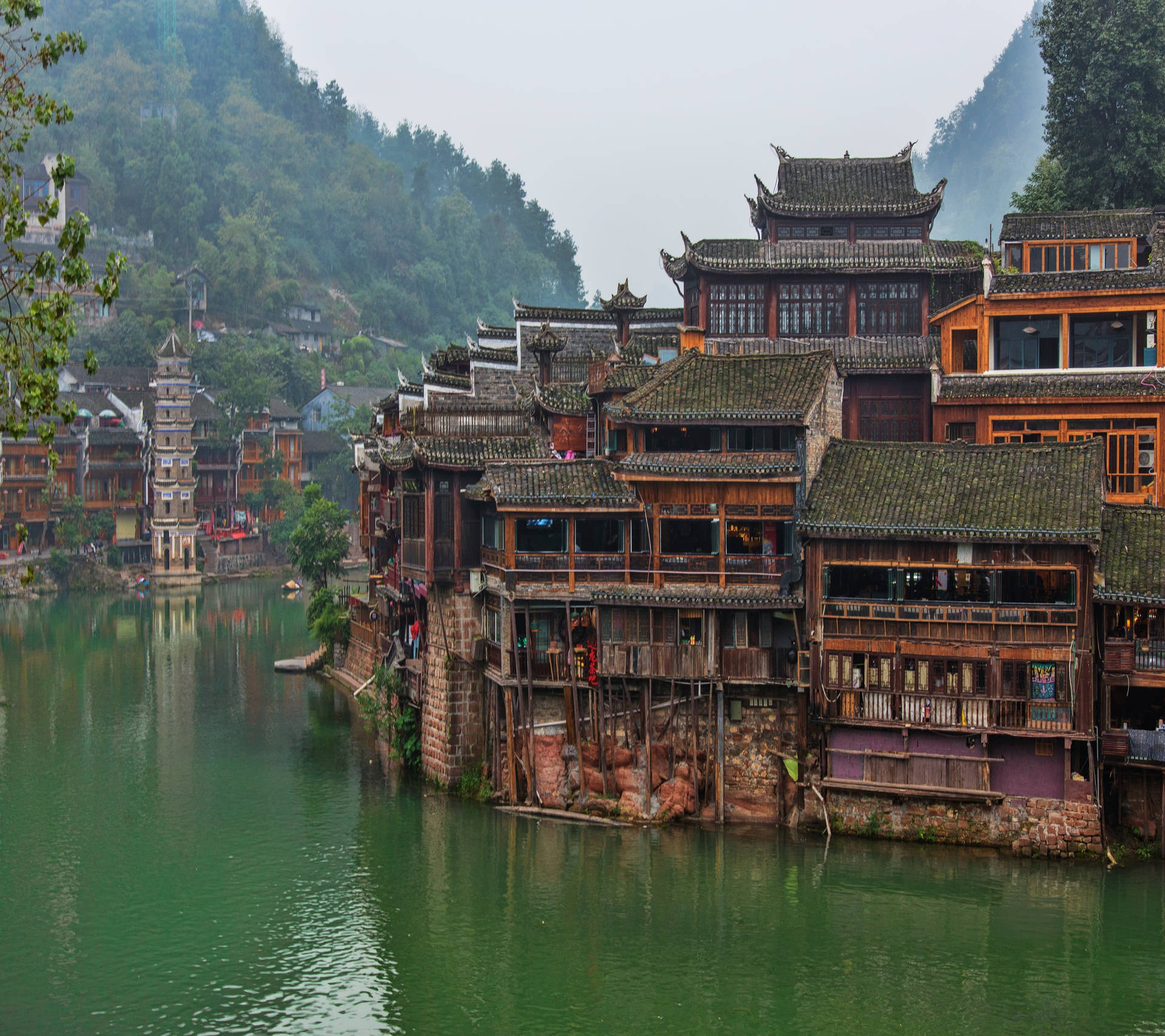 Chinese Houses On Water Background