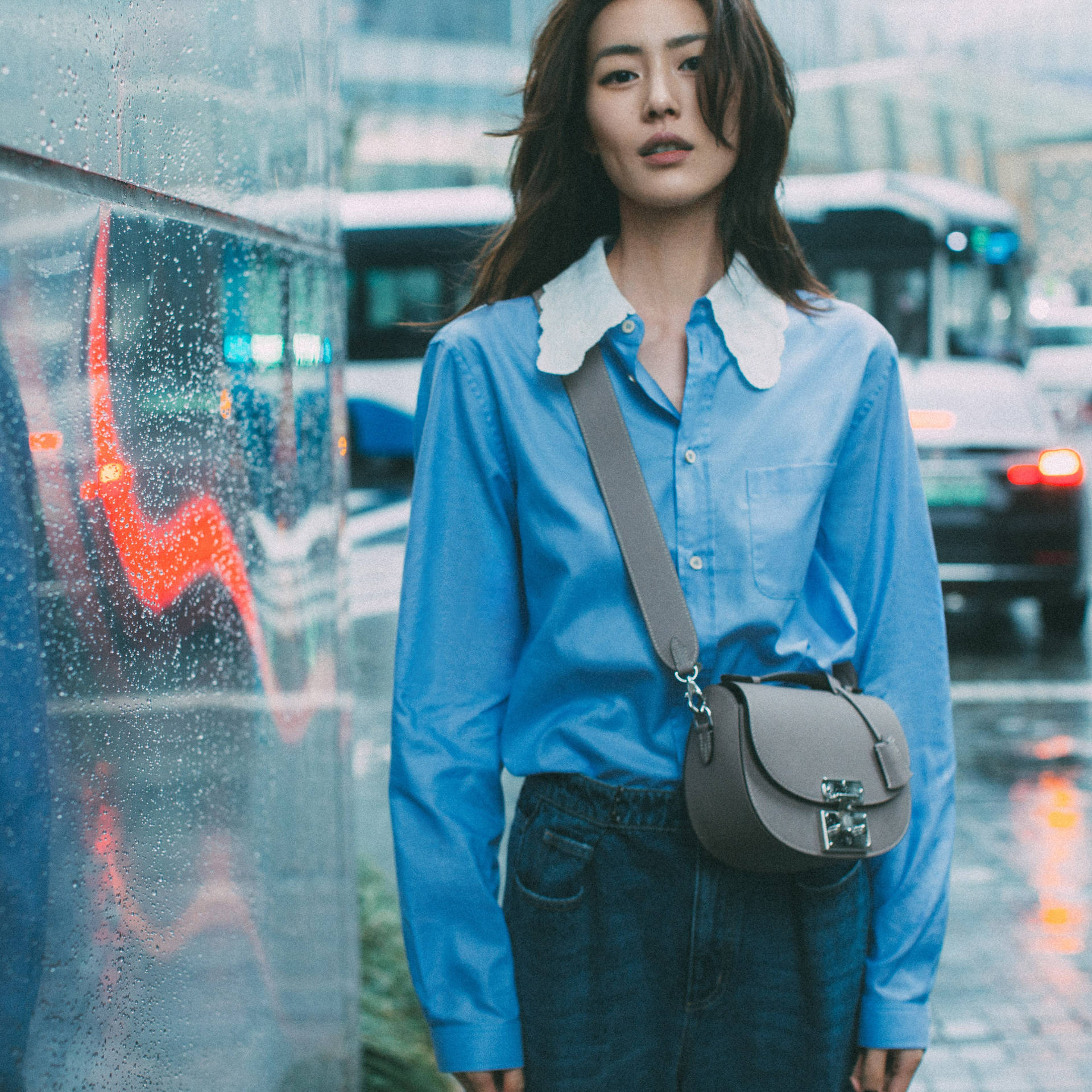 Chinese Model Liu Wen Flaunts A Designer Moynat Bag Background