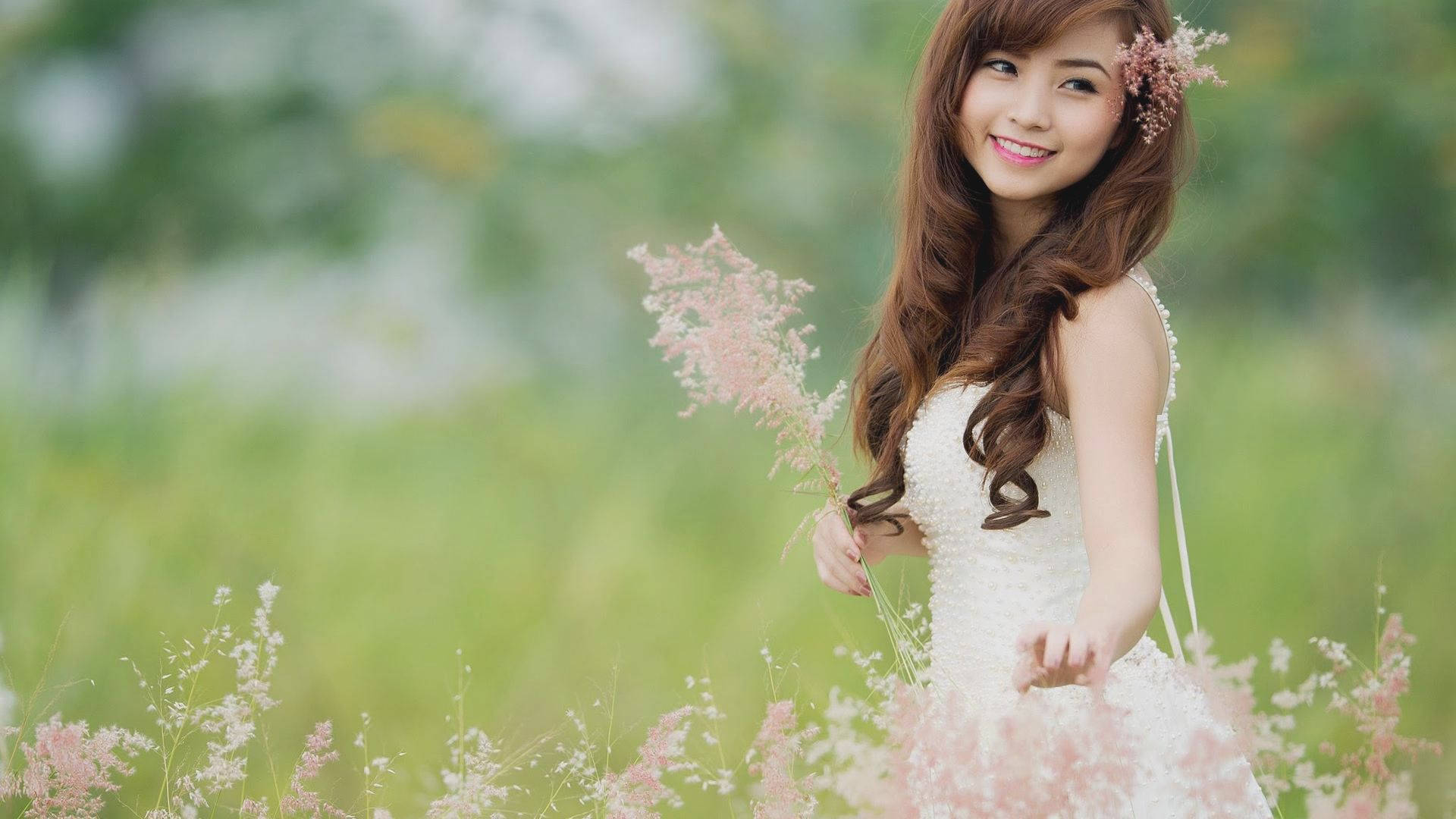 Chinese Woman On Flower Field Background