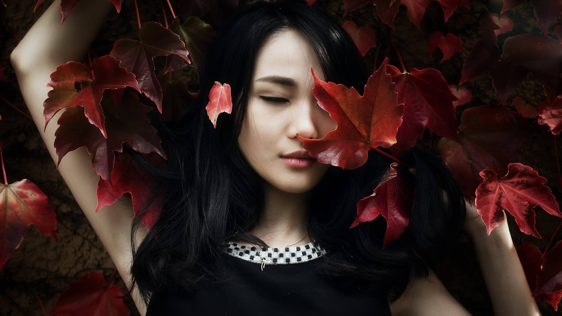 Chinese Woman With Autumn Leaves Background