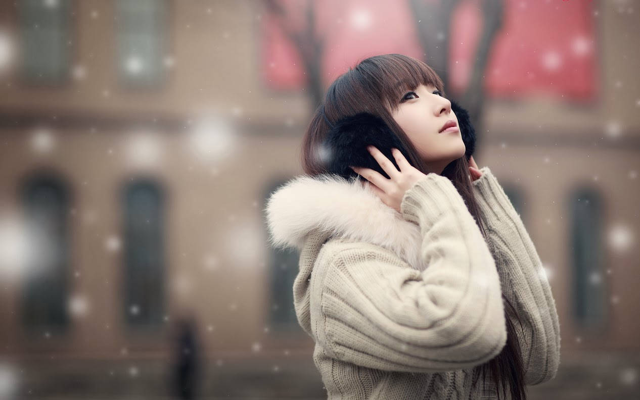 Chinese Woman With Earmuffs Background