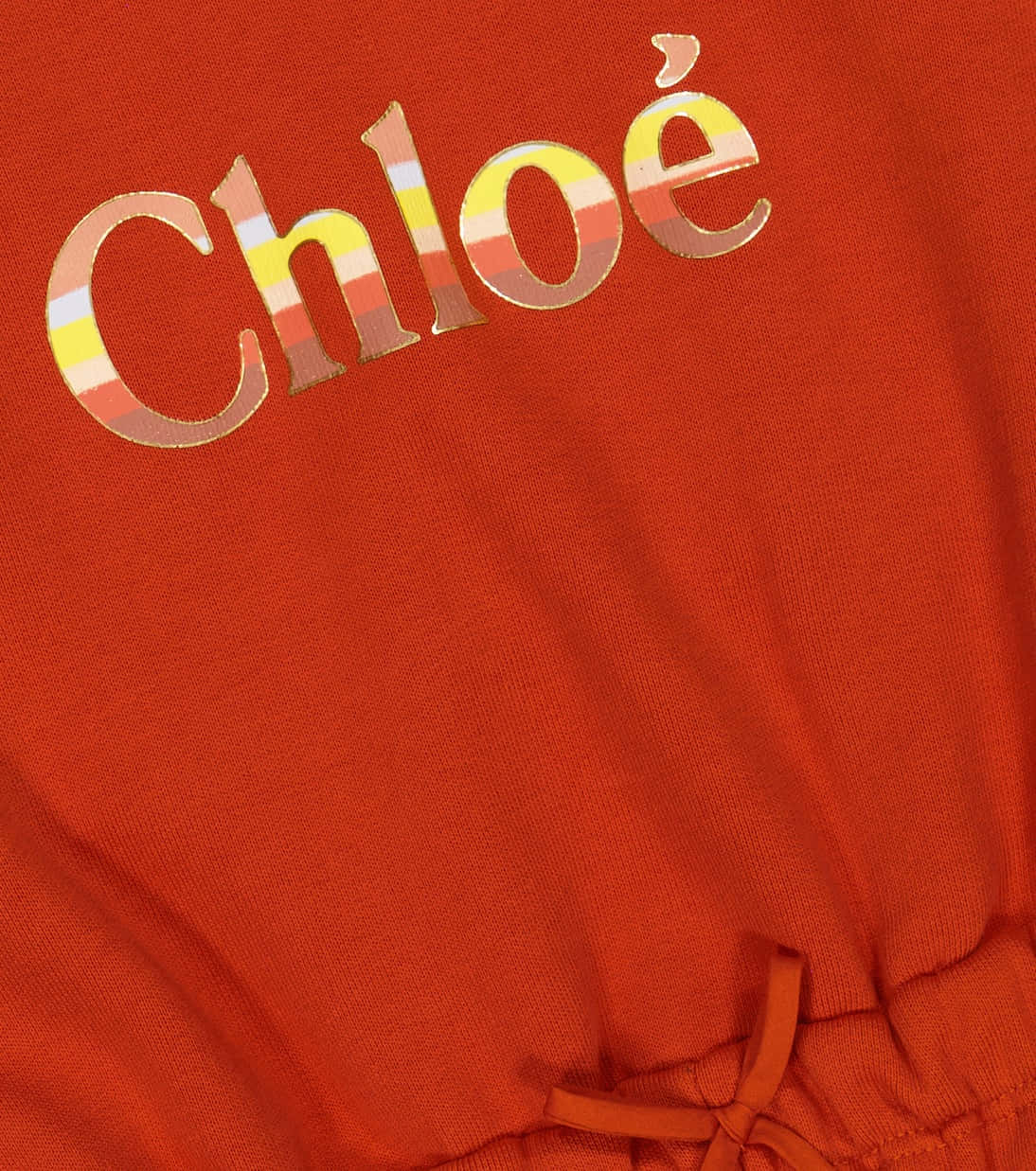 Chloe Branded Orange Fabric Closeup Background