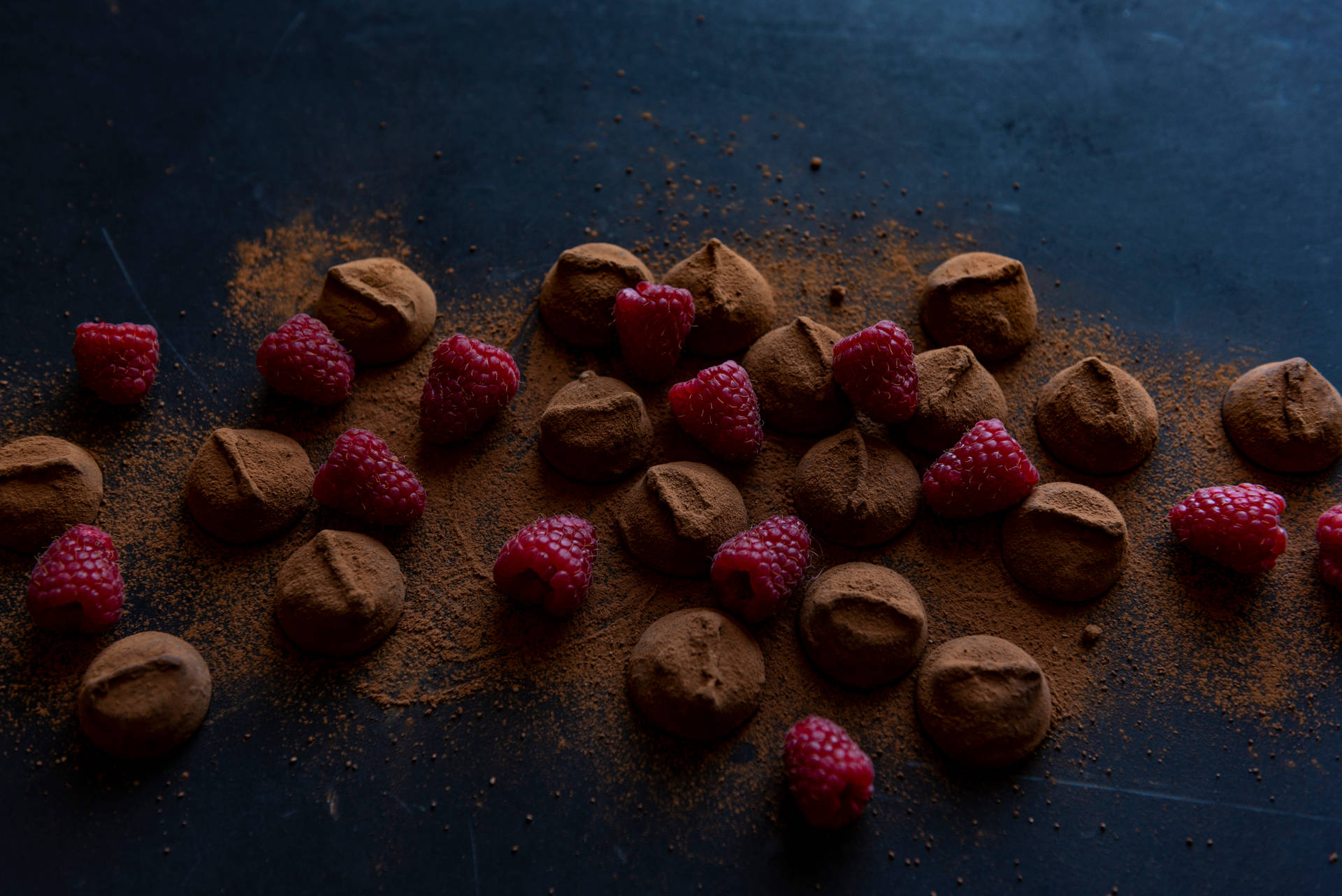 Chocolate Bites And Raspberries Background