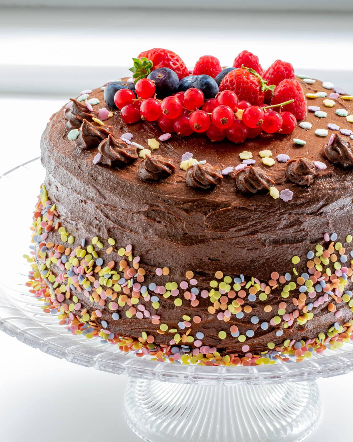 Chocolate Cake Decorated With Berries Background