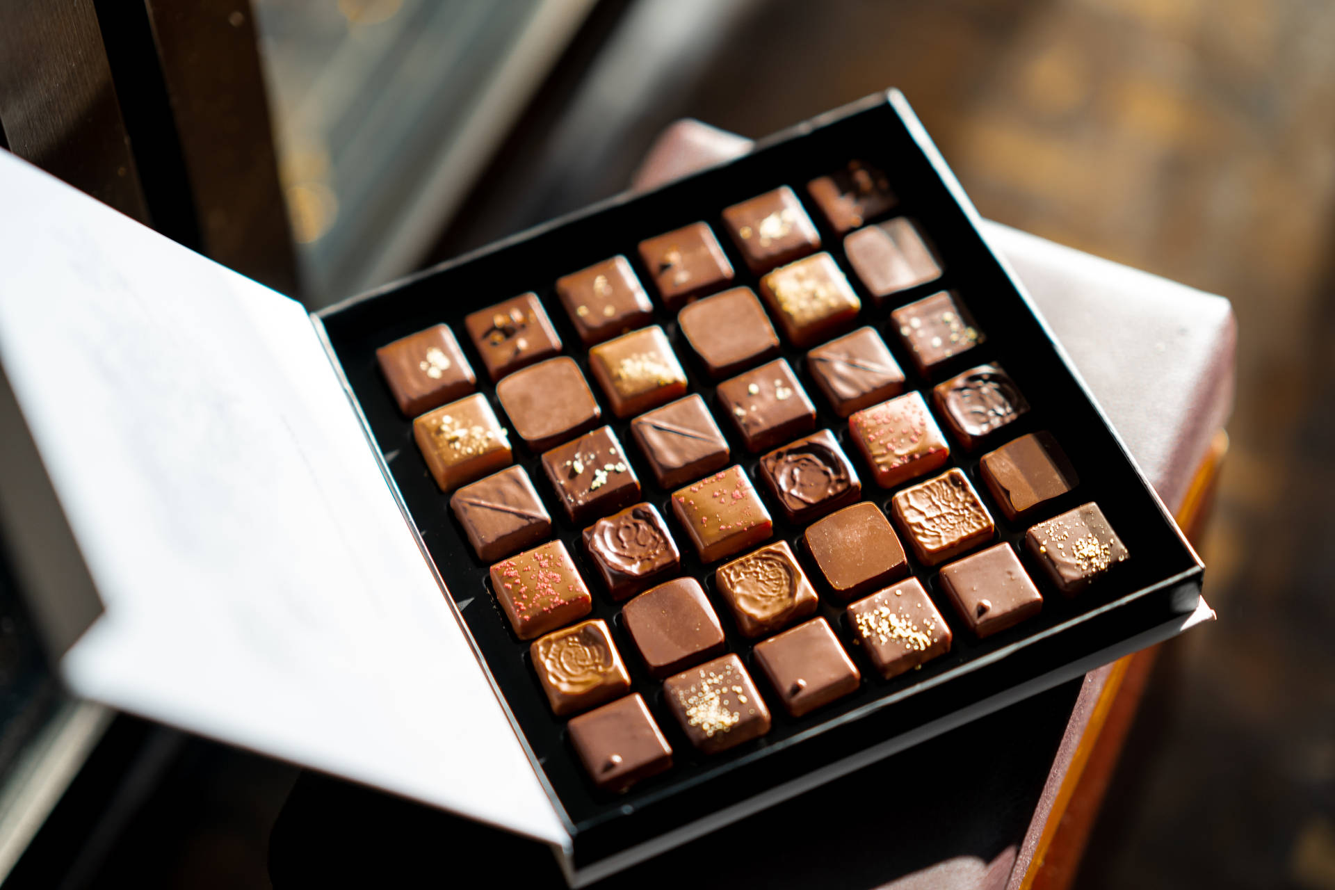 Chocolate Cubes In Box Background