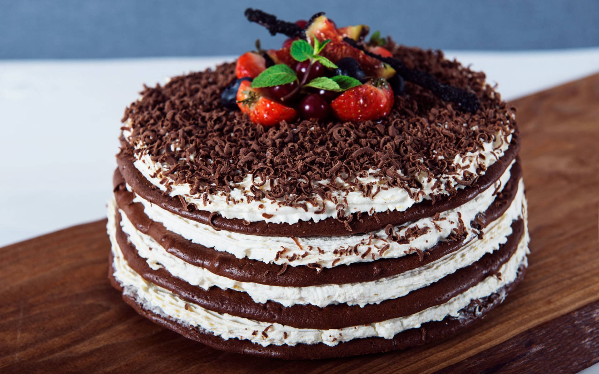 Chocolate Layered Cake With Berries Background