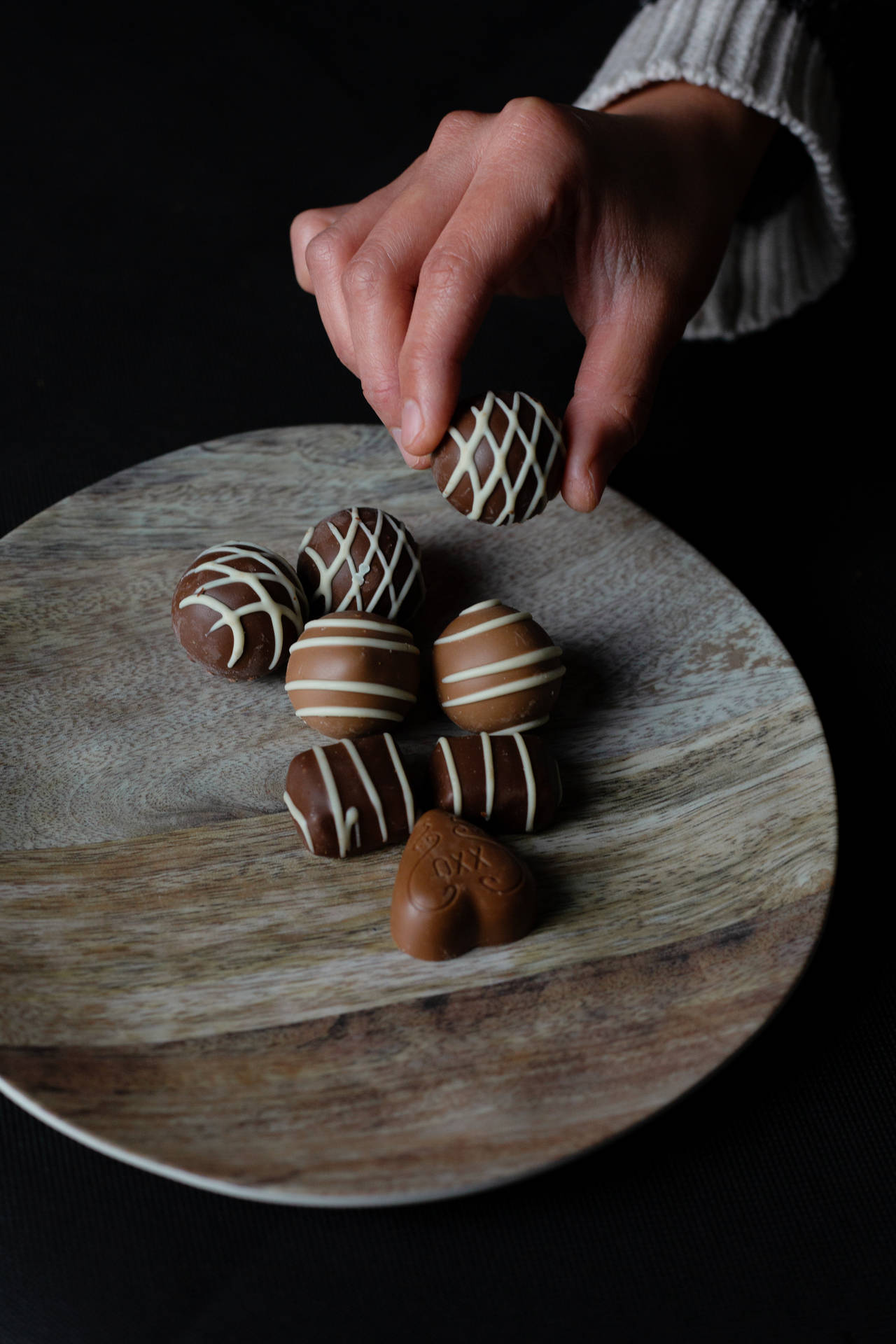 Chocolate Truffles On Plate Background