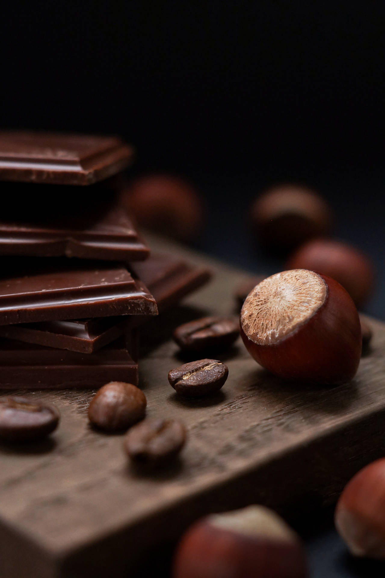 Chocolate With Hazelnuts Background