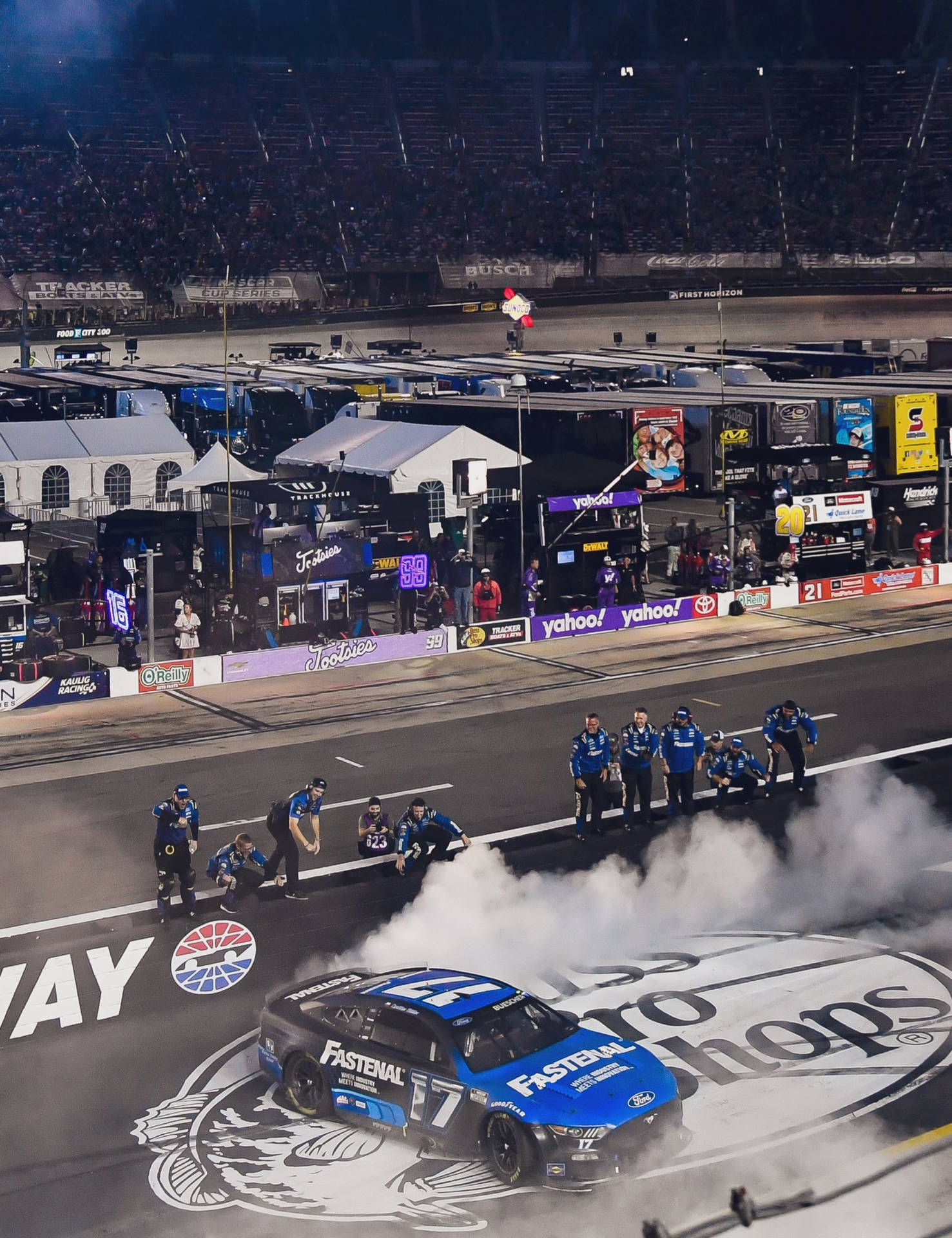 Chris Buescher Competing In A High-speed Car Race