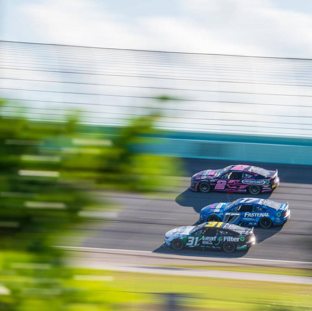 Chris Buescher In Action - An Intense Motor Racing Scene