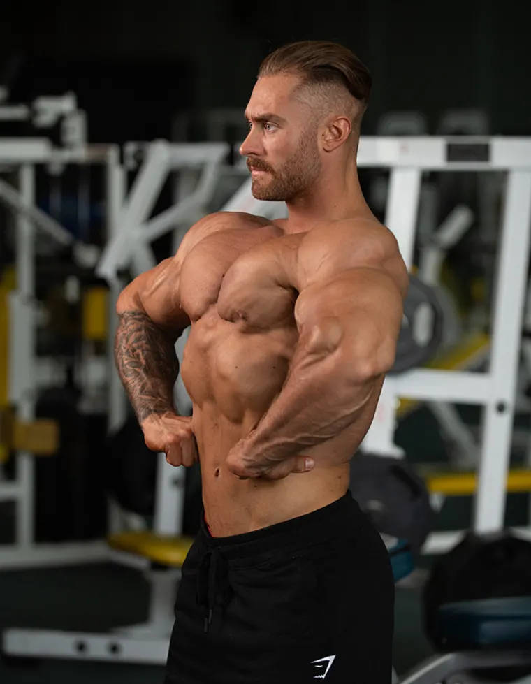 Chris Bumstead Lat Spread Side Profile Background