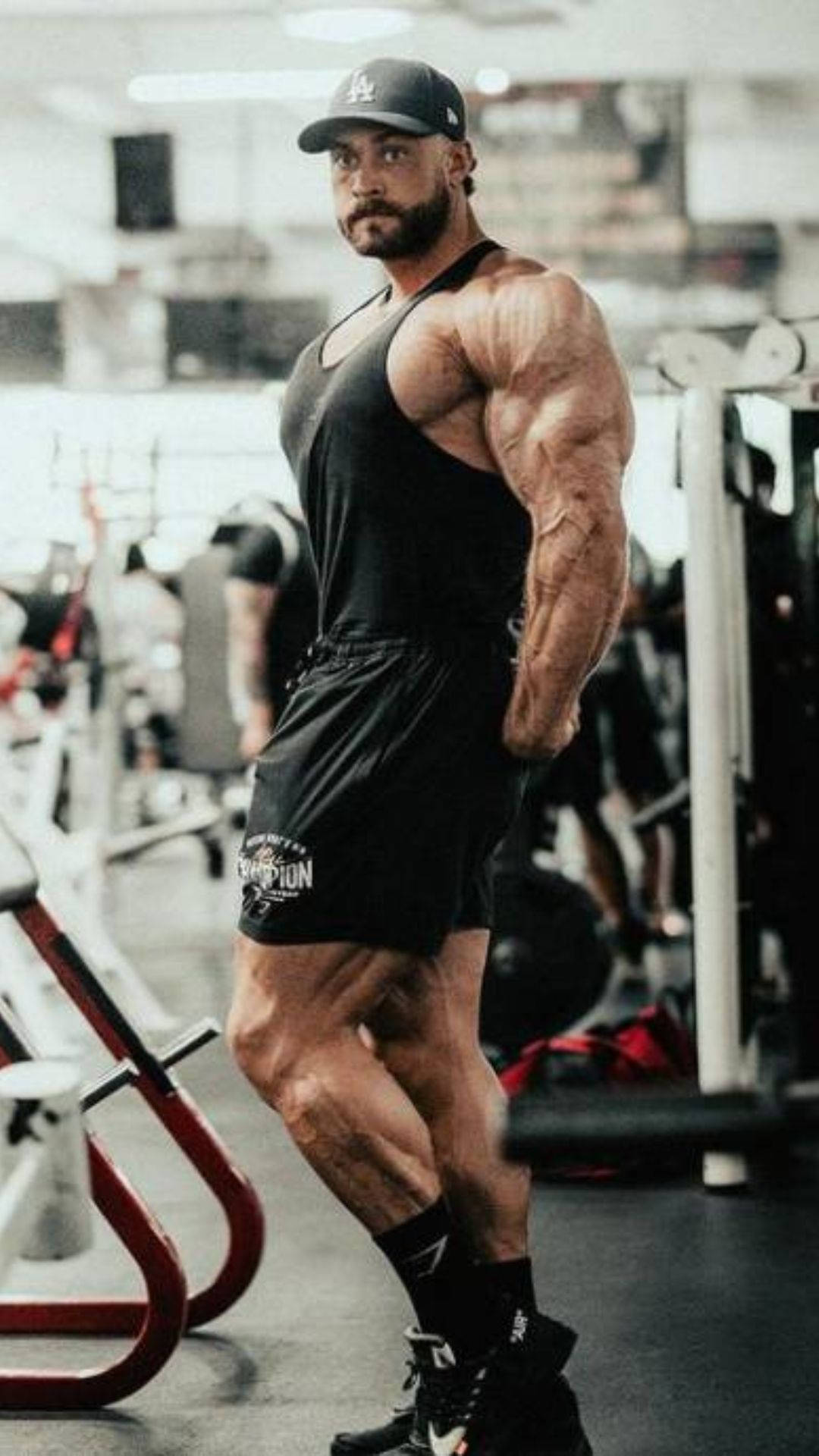 Chris Bumstead Side Profile Photo Background