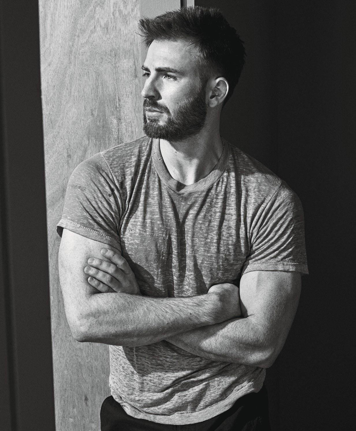 Chris Evans With Muscular Arms Background