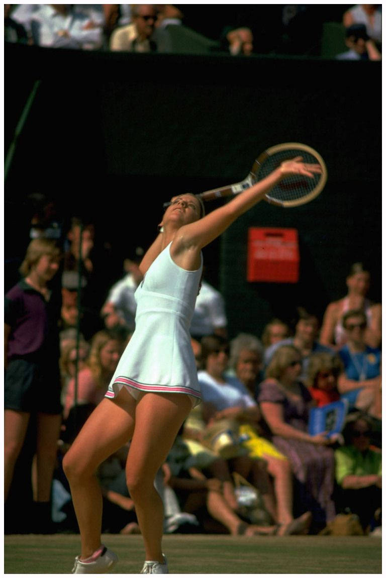 Chris Evert About To Smash A Ball Background