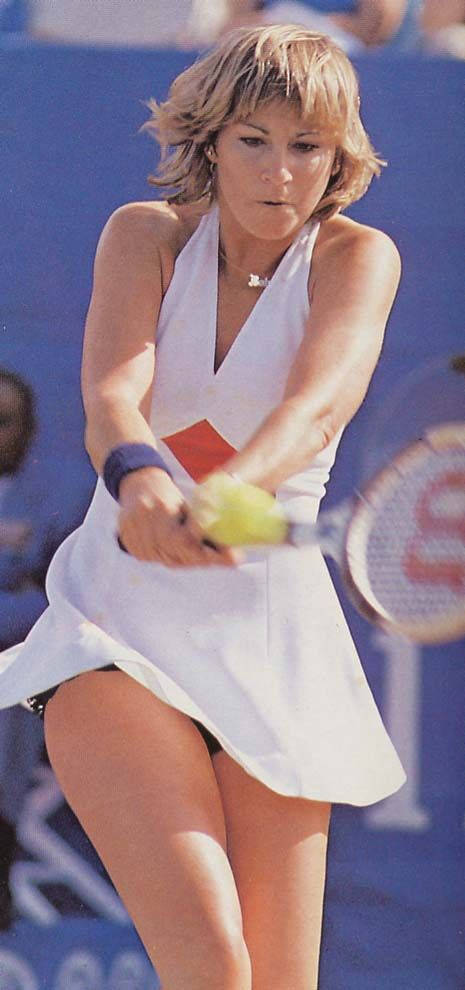 Chris Evert Hitting A Tennis Ball Background