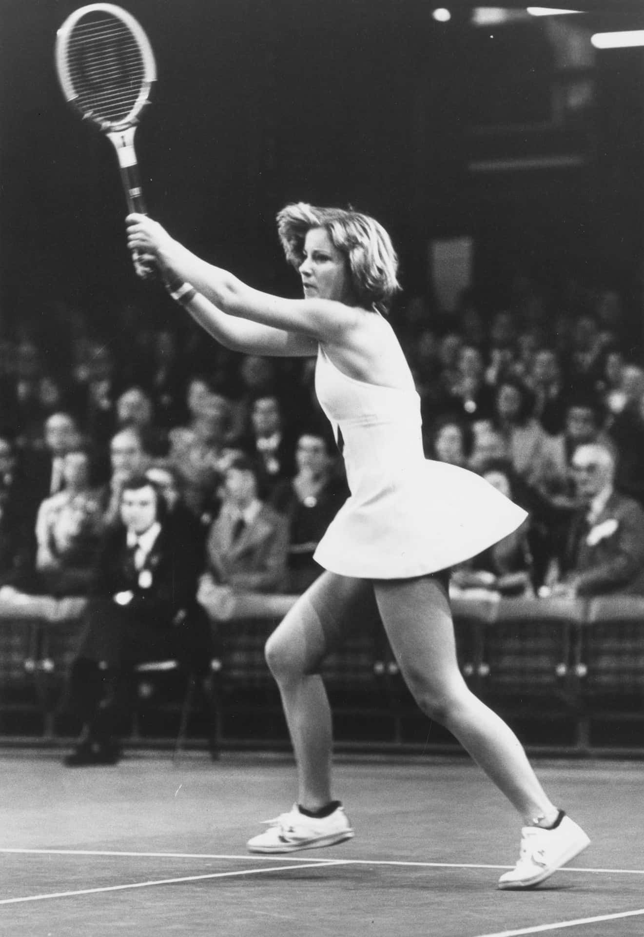 Chris Evert In Action - Powerful Court Chase Background