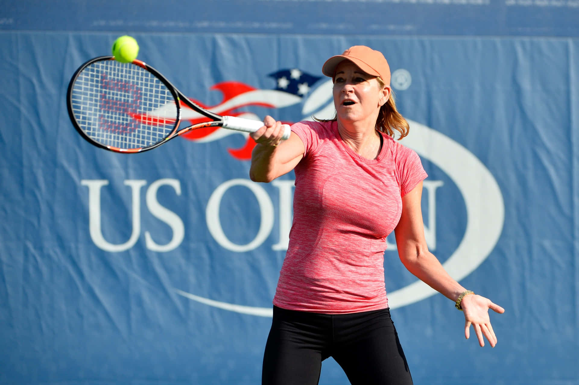 Chris Evert Showcasing Her Strong Backhand Stroke. Background