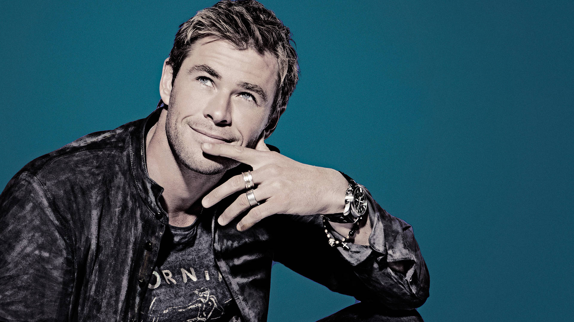 Chris Hemsworth Exudes Cool Vibes In Black Leather Jacket Background
