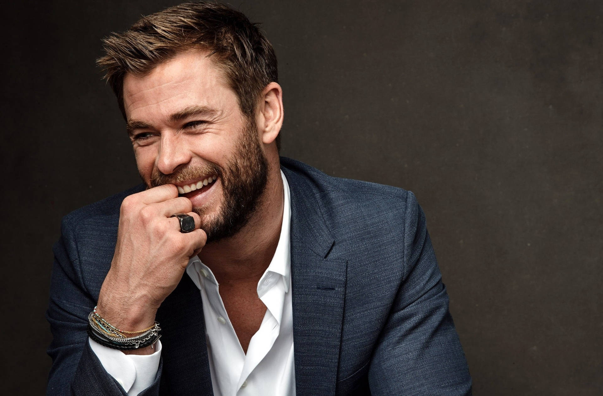 Chris Hemsworth Looking Happy Background
