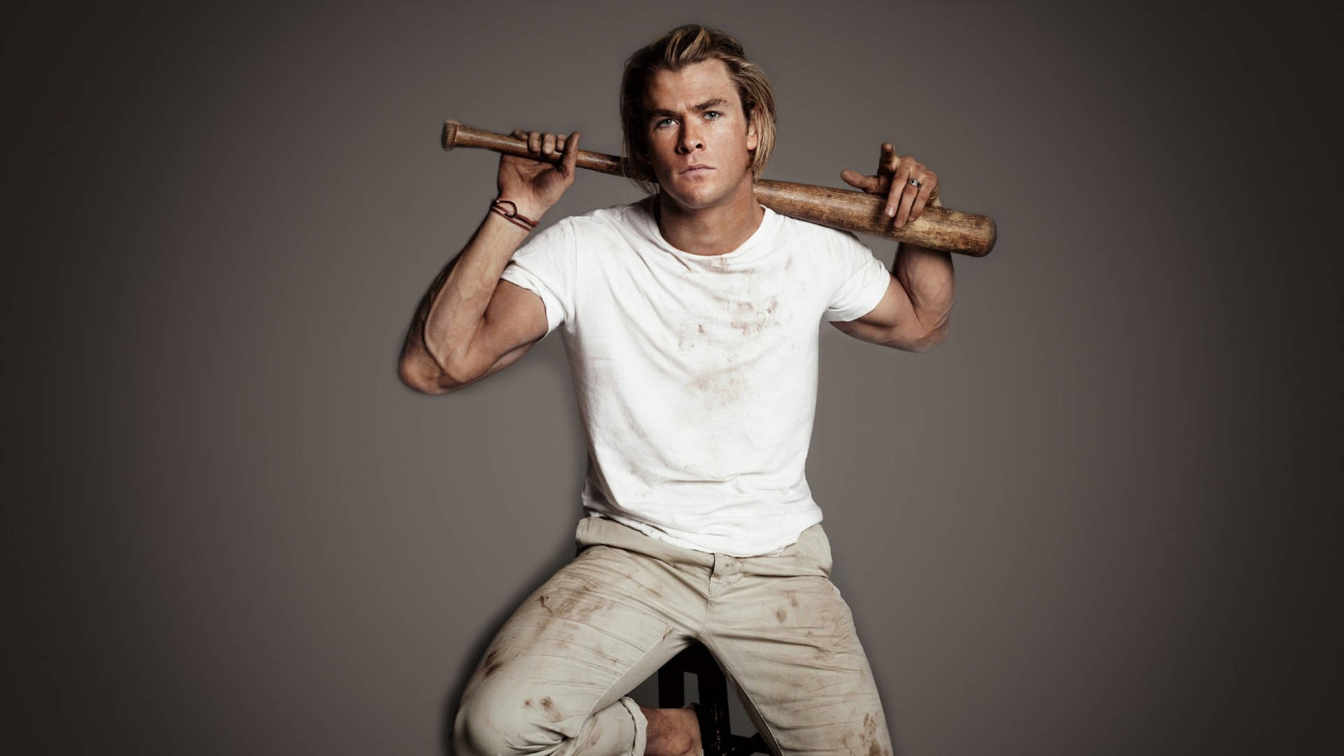 Chris Hemsworth, Star Of Thor And The Avengers Series, Holds A Bat. Background