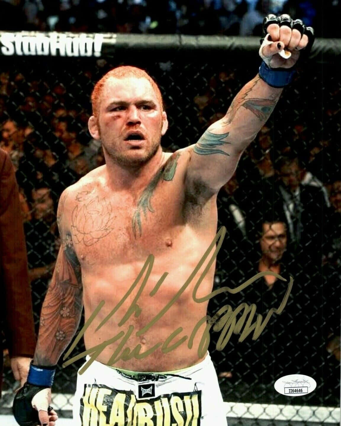 Chris Leben Celebrating In The Octagon Background