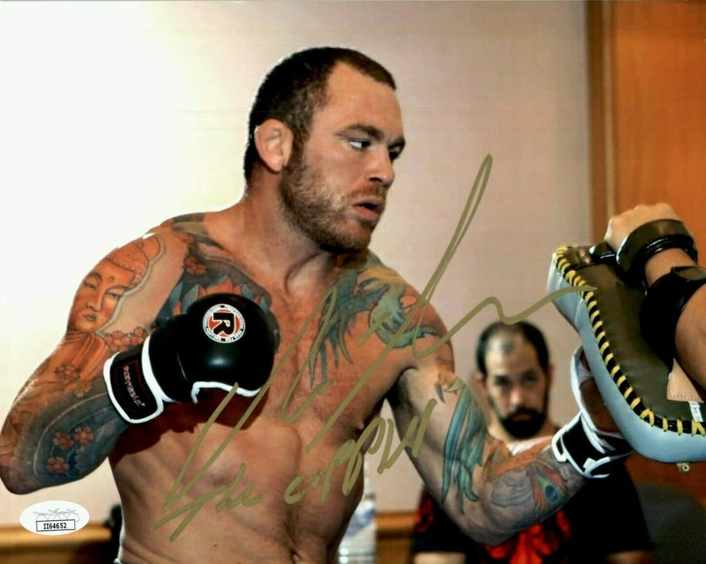 Chris Leben In Action | Boxing Gloves Ready For Match Background